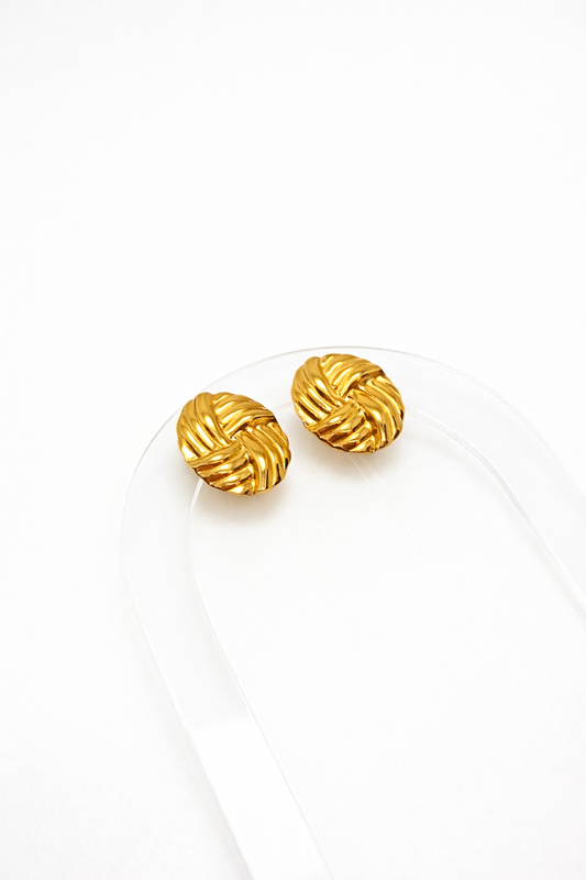 Gold sculpted earrings by Atelier Épure with a textured knot-inspired design — elegant, timeless, and refined.