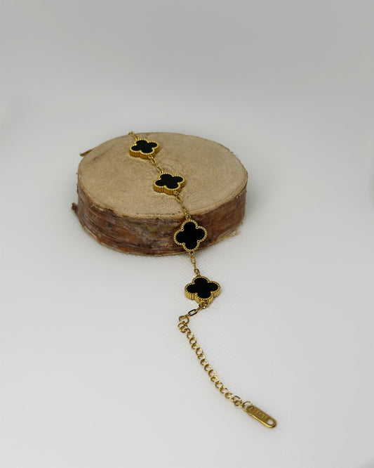 18K gold-plated clover bracelet with black enamel by Atelier Épure elegant, timeless, and effortlessly refined.