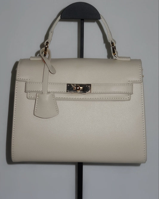 Ivory structured handbag by Atelier Épure elegant, timeless, and effortlessly refined.