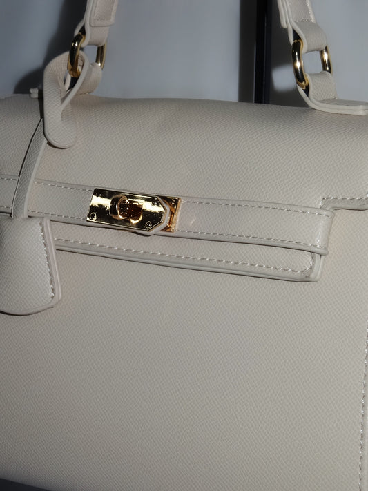 Ivory structured handbag by Atelier Épure elegant, timeless, and effortlessly refined.