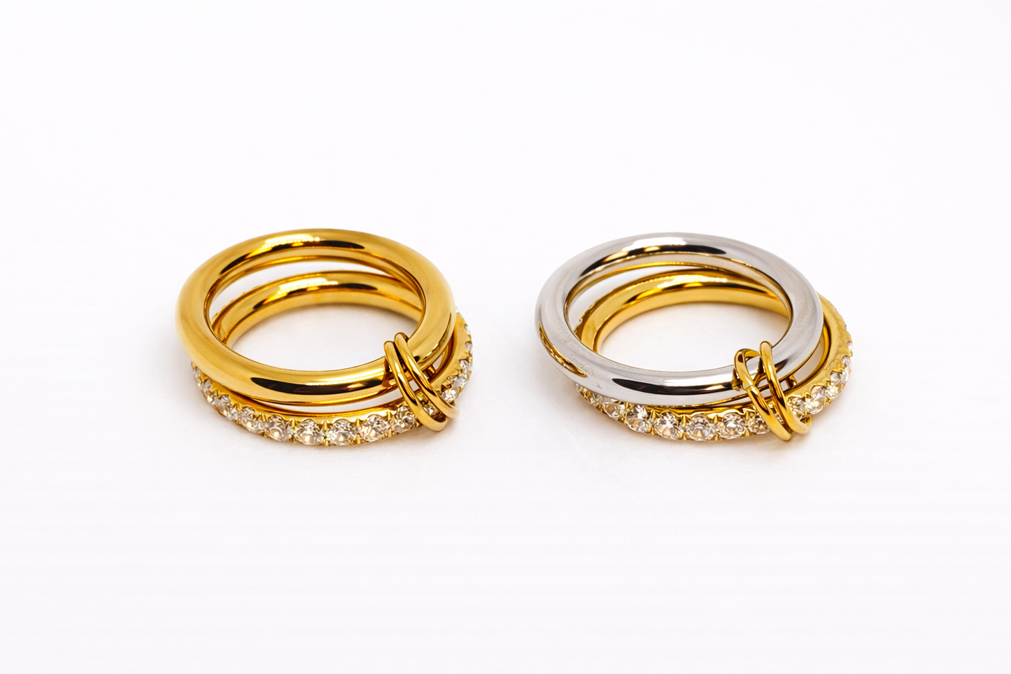 Dual-tone gold and silver statement ring with knot detail by Atelier Épure — modern, bold and elegant.