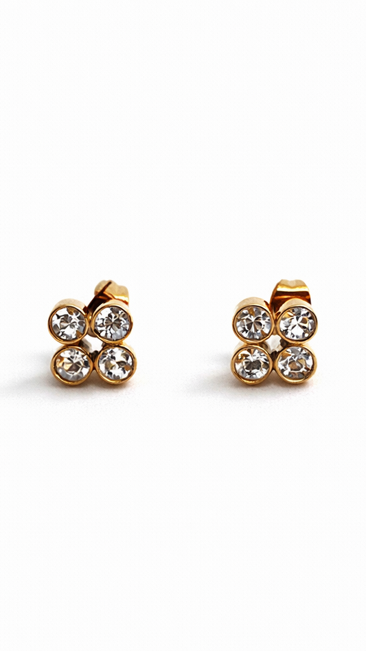 Gold-plated jewellery set with zirconia stones by Atelier Épure  elegant, structured, and timeless.