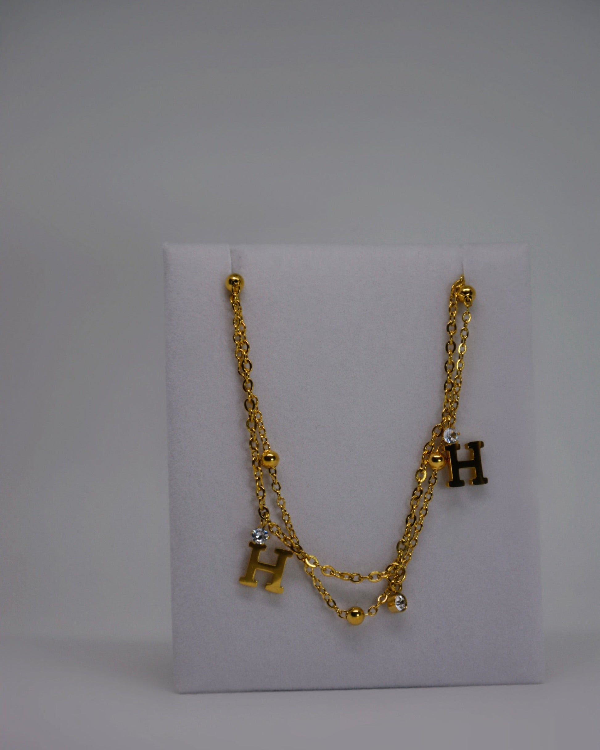 Honey Haze Bracelet — gold-plated stainless steel double-wrap bracelet by Atelier ÉPURE, featuring crystal accents and delicate charm, water-resistant and hypoallergenic.