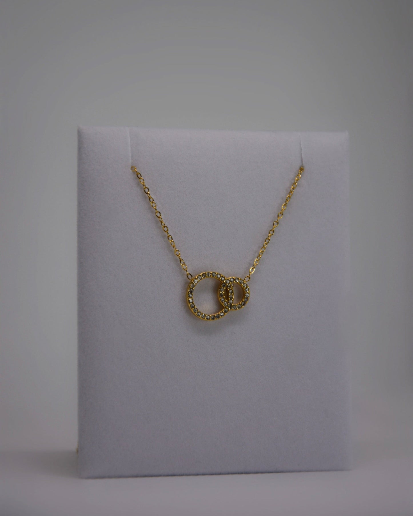 18K gold-plated double-circle necklace by Atelier Épure; elegant, timeless, and effortlessly refined.