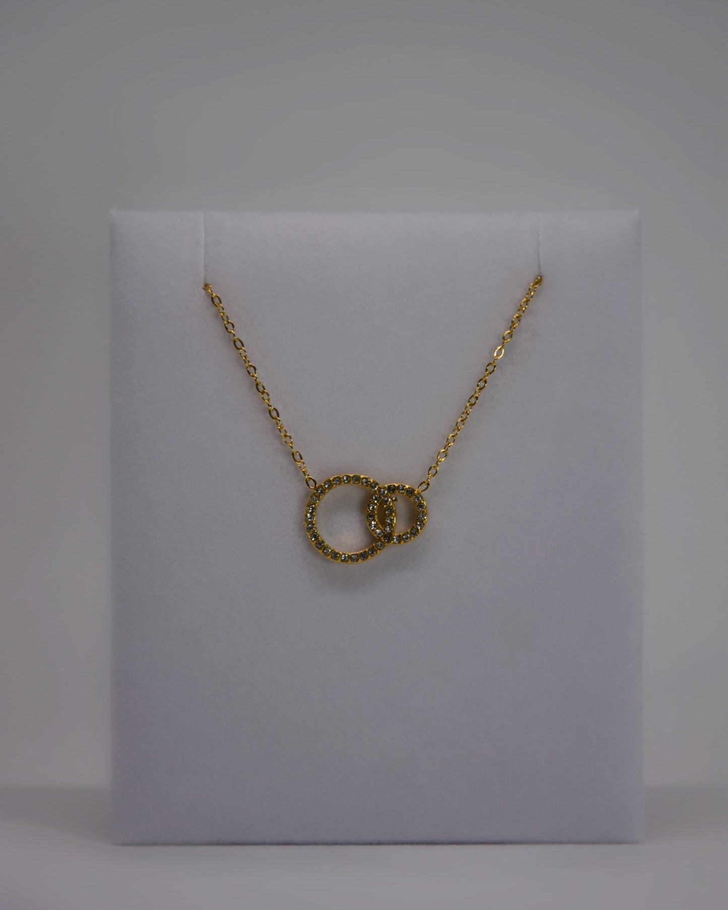 18K gold-plated double-circle necklace by Atelier Épure; elegant, timeless, and effortlessly refined.