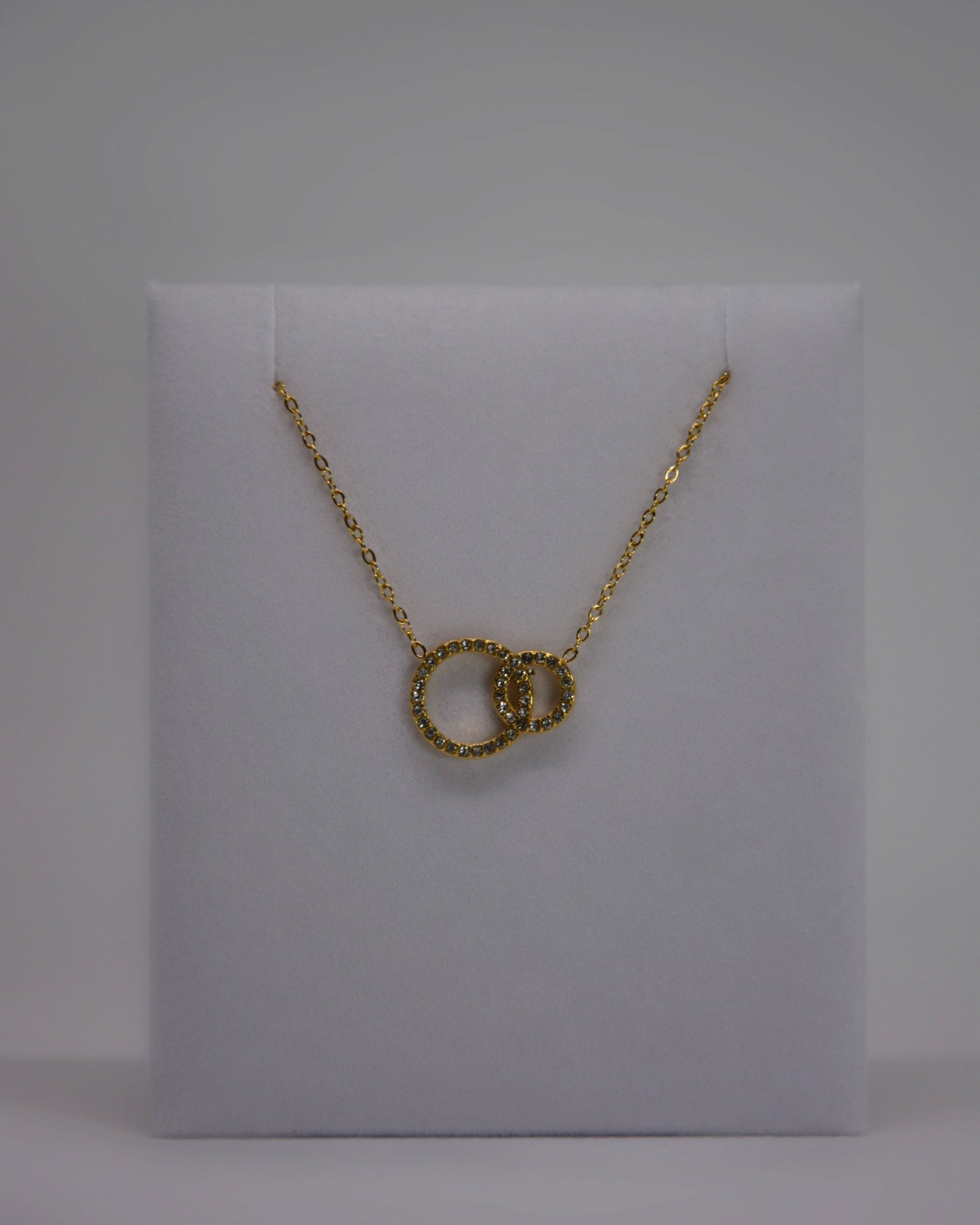 18K gold-plated double-circle necklace by Atelier Épure; elegant, timeless, and effortlessly refined.
