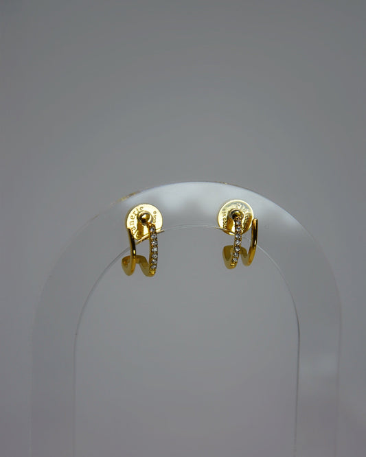 Rivea Earrings 18K gold-plated double hoop studs with sparkling cubic zirconia accents, designed for subtle, timeless elegance in the Atelier ÉPURE signature style.