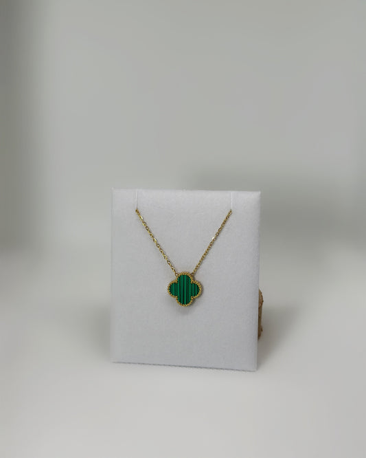 18K gold-plated clover necklace with green enamel by Atelier Épure; elegant, timeless, and effortlessly refined.