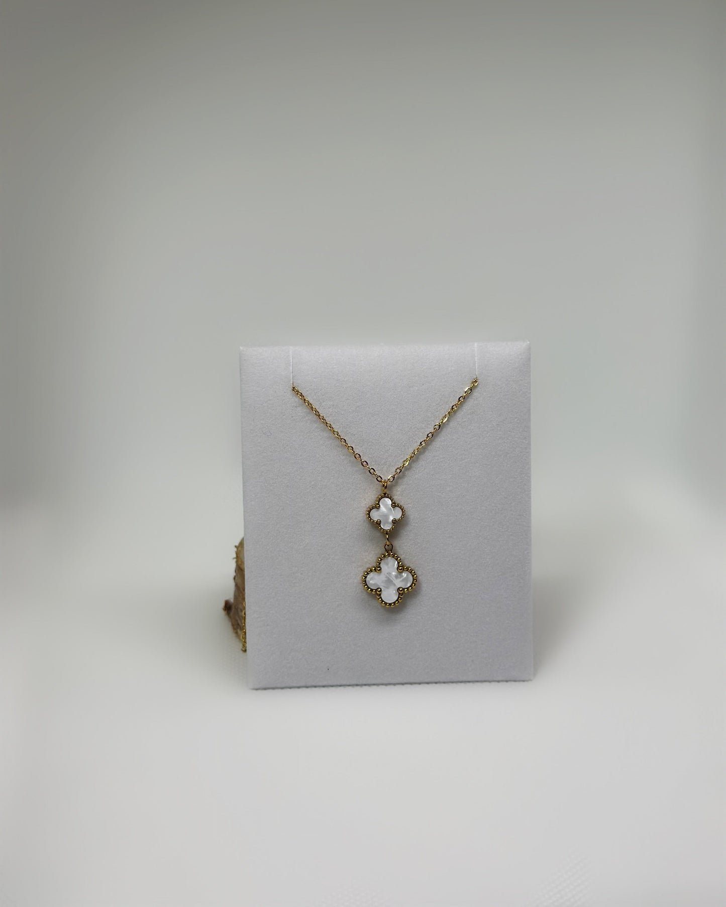 18K gold-plated double clover necklace with white enamel by Atelier Épure elegant, timeless, and effortlessly refined.