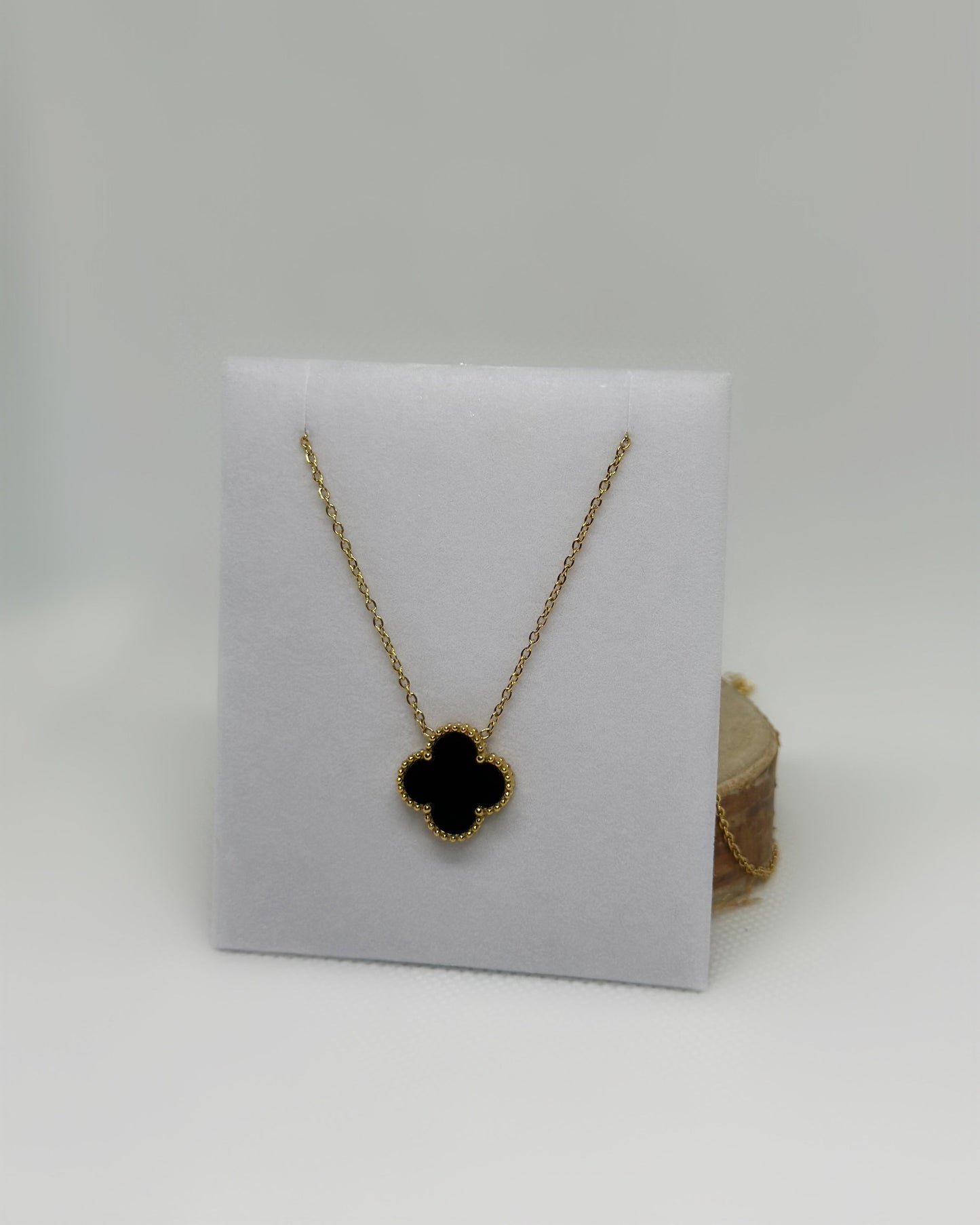 18K gold-plated clover necklace with black enamel by Atelier Épure elegant, timeless, and effortlessly refined.