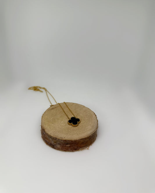 18K gold-plated clover necklace with black enamel by Atelier Épure, elegant, timeless, and effortlessly refined.