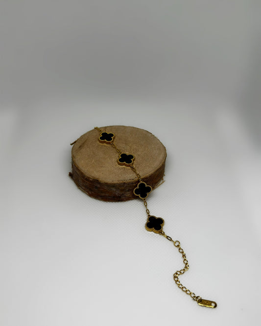 18K gold-plated clover bracelet with black enamel by Atelier Épure elegant, timeless, and effortlessly refined.