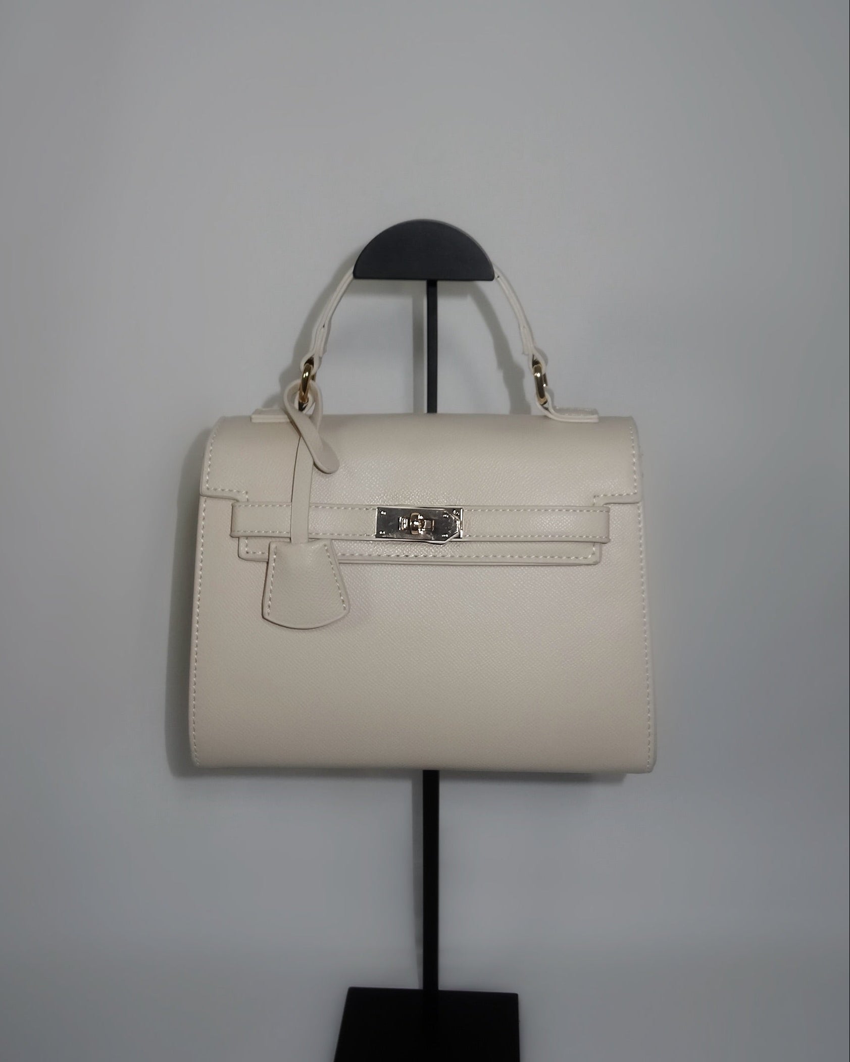 Ivory structured handbag by Atelier Épure elegant, timeless, and effortlessly refined.