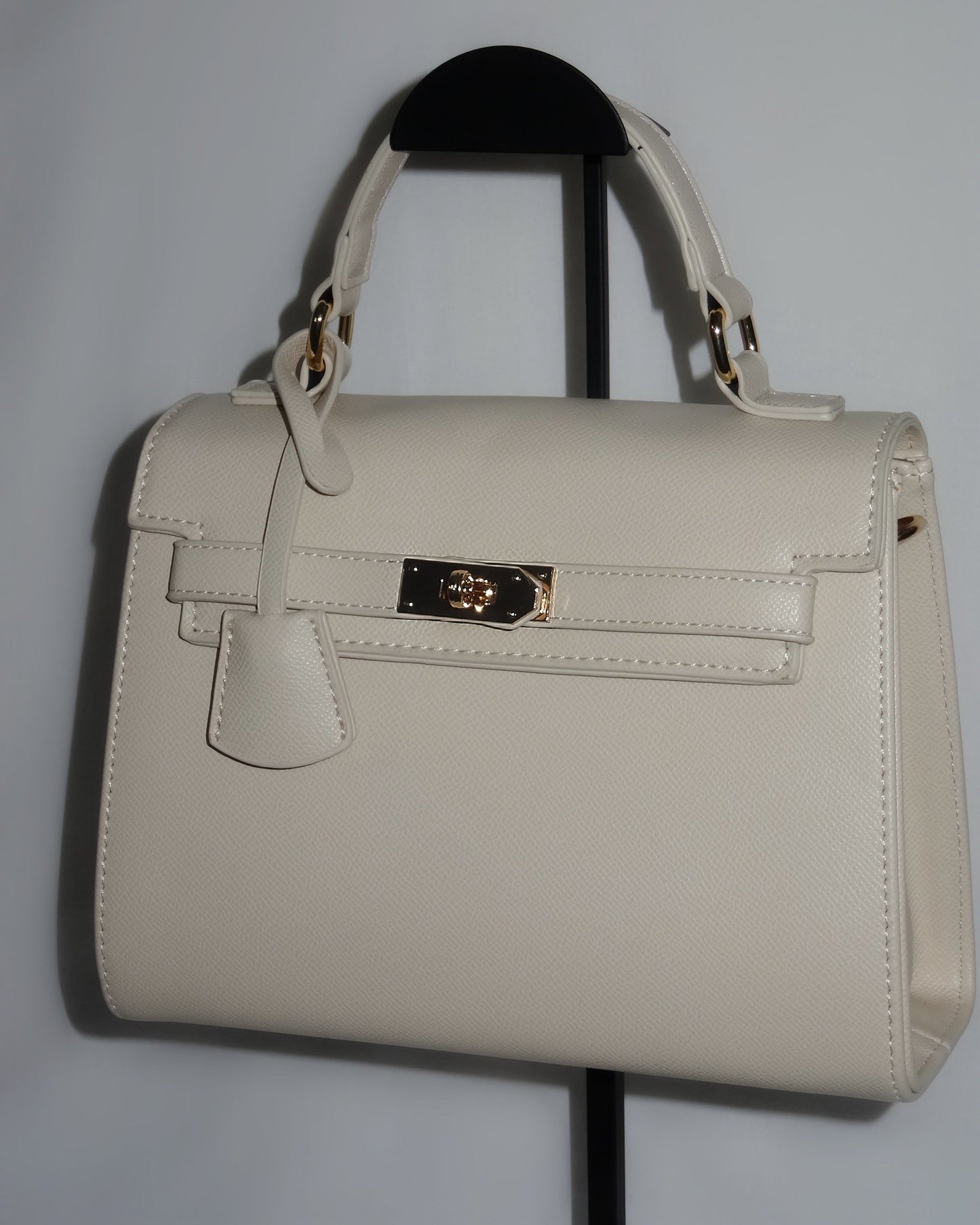 Ivory structured handbag by Atelier Épure elegant, timeless, and effortlessly refined.
