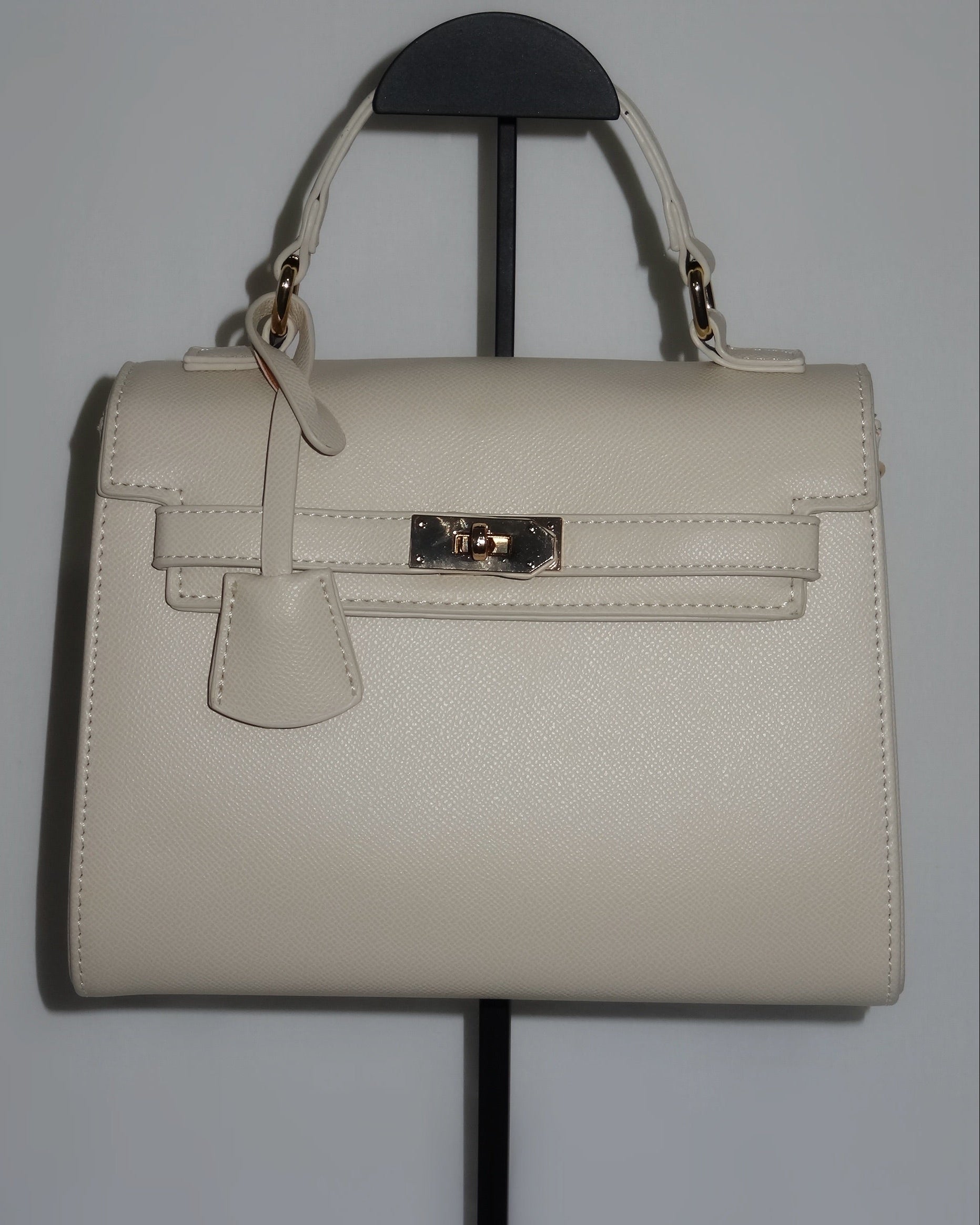 Ivory structured handbag by Atelier Épure elegant, timeless, and effortlessly refined.